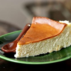 Photo by mahyar mirghasemi a piece of cheesecake on a green plate